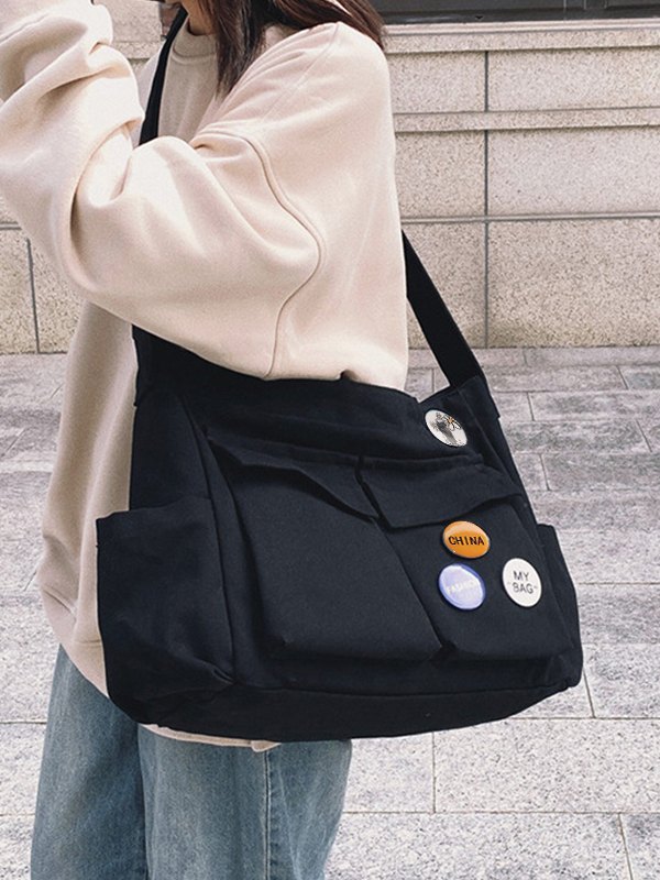 Bandolera grande con diseño de insignia-1